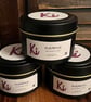 Aventos scented soy candle in a black tin
