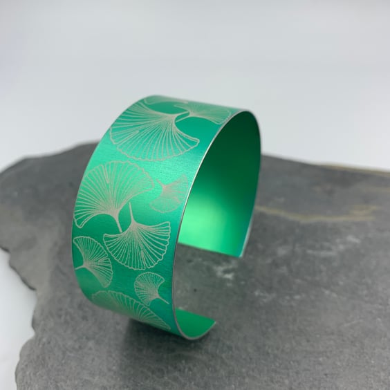 Green aluminium ginkgo cuff.