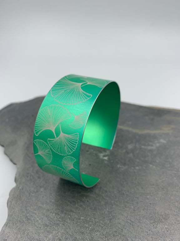 Green aluminium ginkgo cuff.