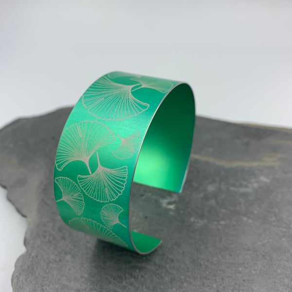 Green aluminium ginkgo cuff.