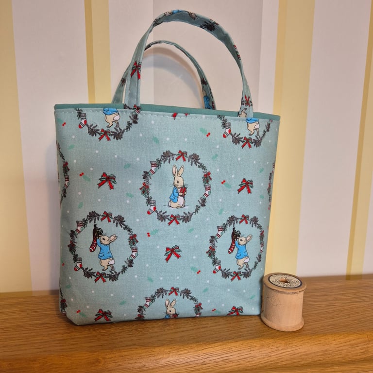 Christmas gift bag; Peter Rabbit hangs up his socking