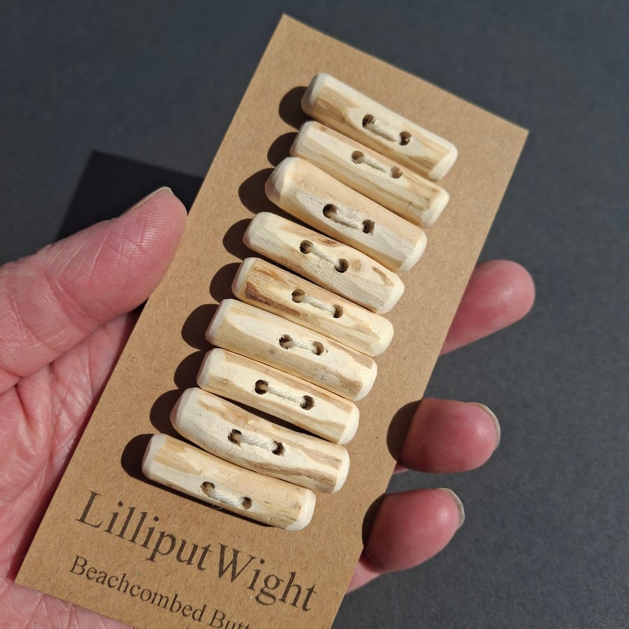 Nine driftwood toggle buttons