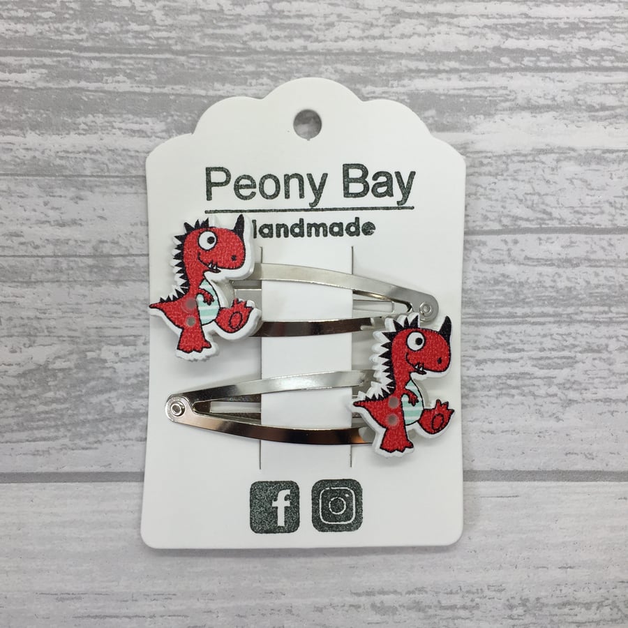 Girl’s dinosaur hair clips in red