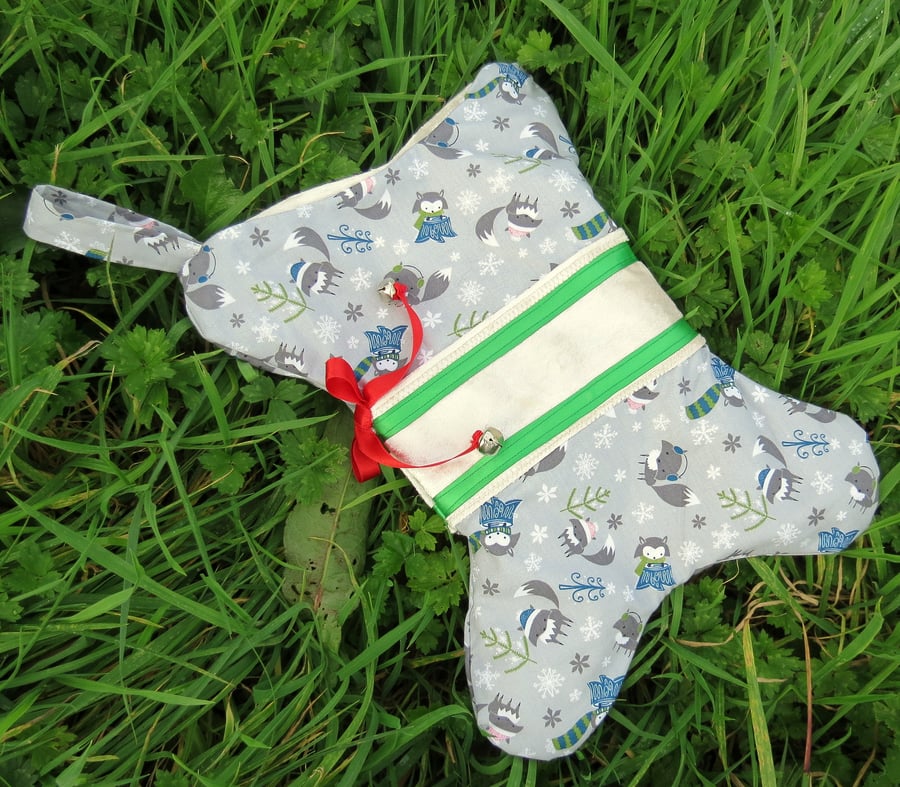 Pet stocking.  A Christmas stocking for a dog or puppy.  Bone shaped stocking.