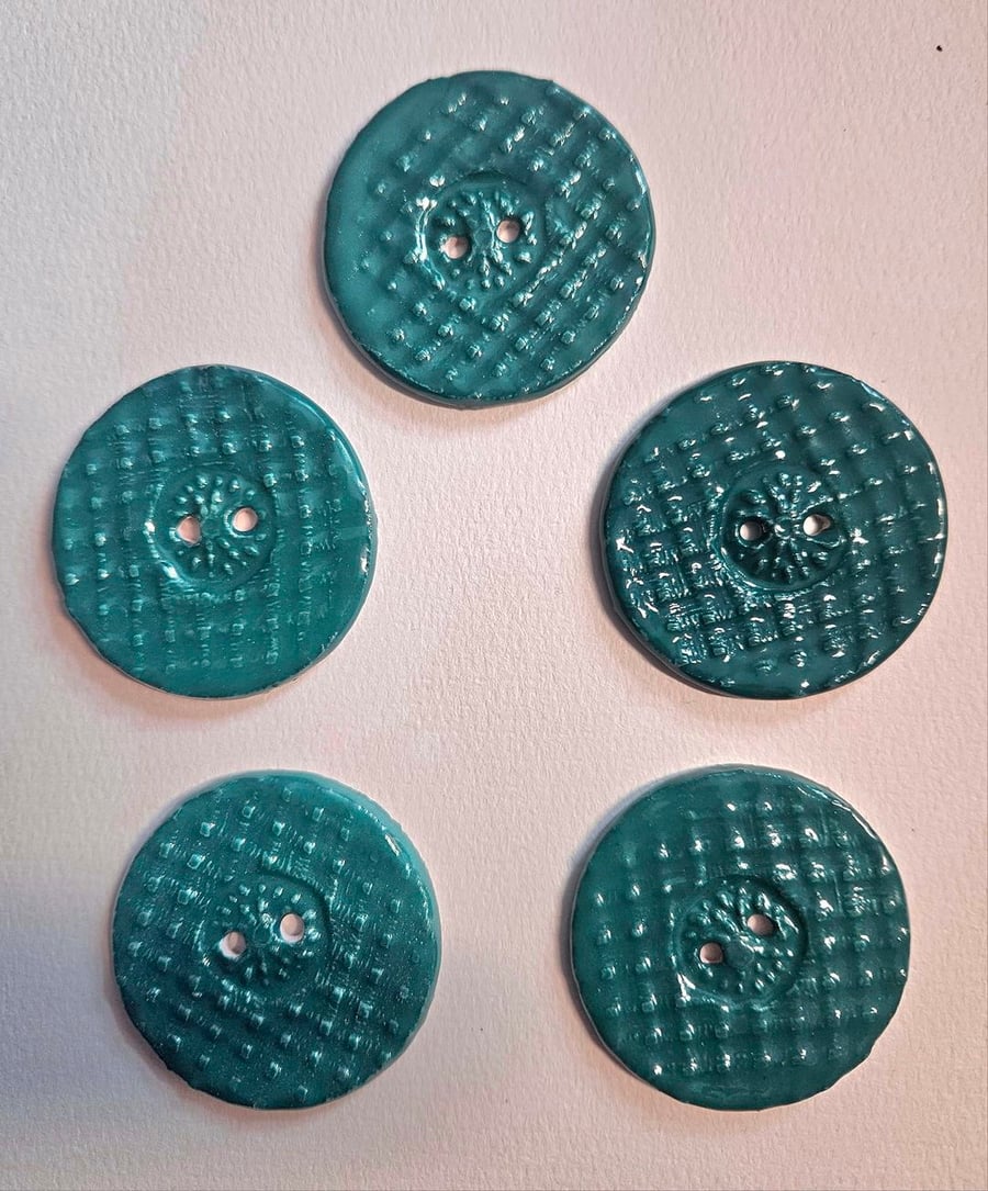 A Set of Five Teal Ceramic Buttons