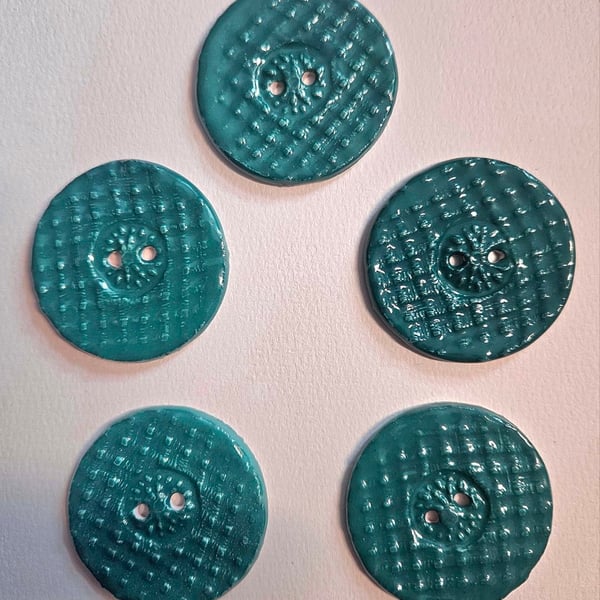 A Set of Five Teal Ceramic Buttons
