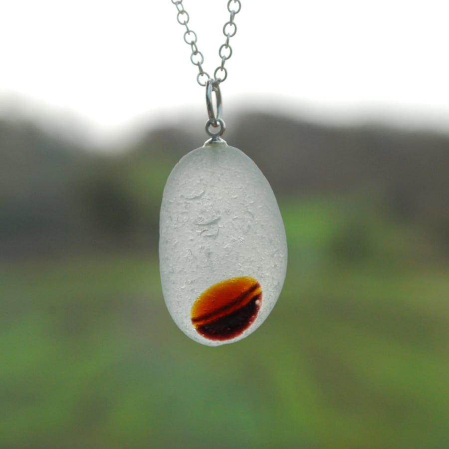 Sea glass pendant with brown stripes