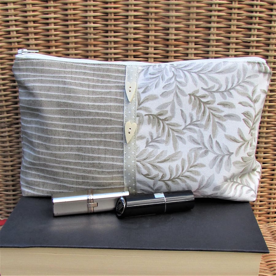 Large cream and beige leaf and stripe pattern cosmetic bag, make up bag