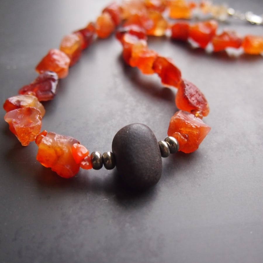 Winter Sunshine - Carnelian Necklace with Black Pebble