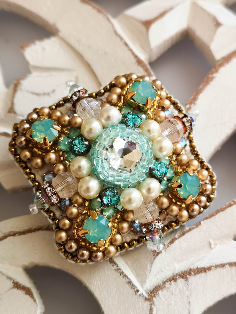 Swarovski crystal green crystal clear and vintage gold embellished beaded brooch