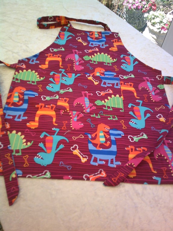 Comical Dinosaurs on Maroon Child's Apron