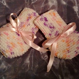 Little spotty knitted baby mittens