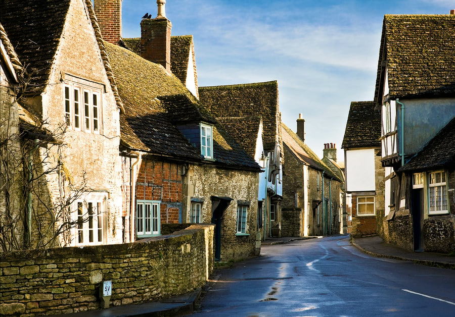 Medieval houses Lacock Wiltshire UK pretty English village street film location 