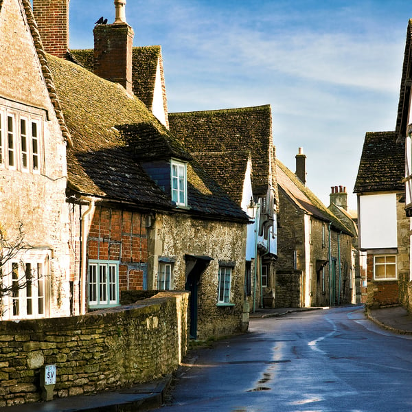 Medieval houses Lacock Wiltshire UK pretty English village street film location 