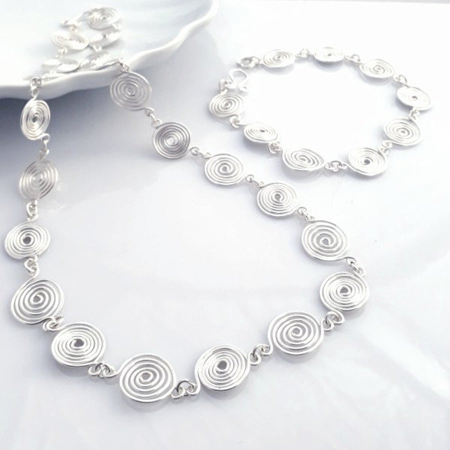 Silver spiral necklace and bracelet set