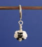 Tiny Glass Sheep Stitch Marker - Image 1