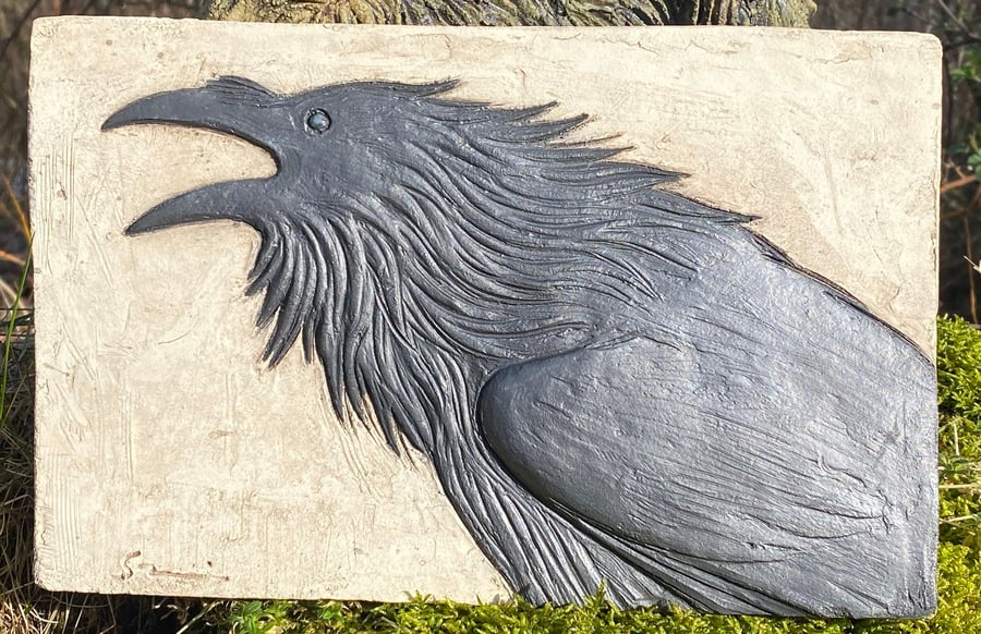 Raven cawing plaque tile in ceramic stoneware.