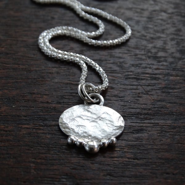 Winter amulet, recycled silver organic textured pendant