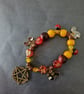 Elasticated nature-inspired beaded charm bracelet with pentacle - Image 5