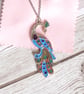 Sky blue peacock pendant with rose gold, turquoise and purple accents - Image 2