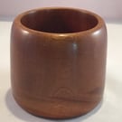 Lidless round storage container.