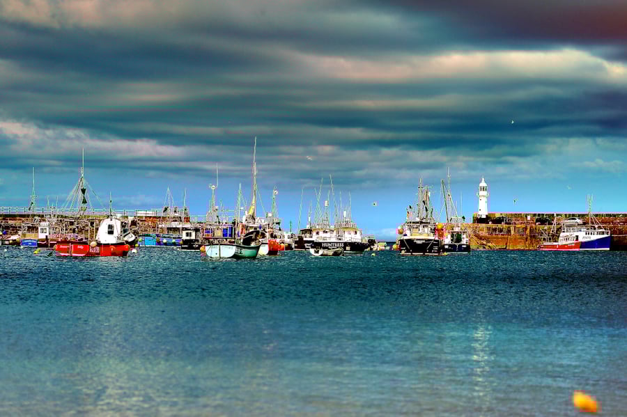 Picture of boats and the breakwaters at Mevagissey Harbour, Cornwall