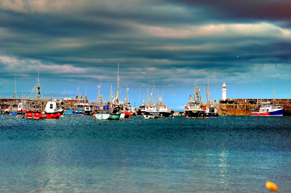 Picture of boats and the breakwaters at Mevagissey Harbour, Cornwall