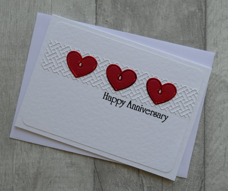 Three Red Hearts on Wicker Panel - Happy Anniversary - Anniversary Card