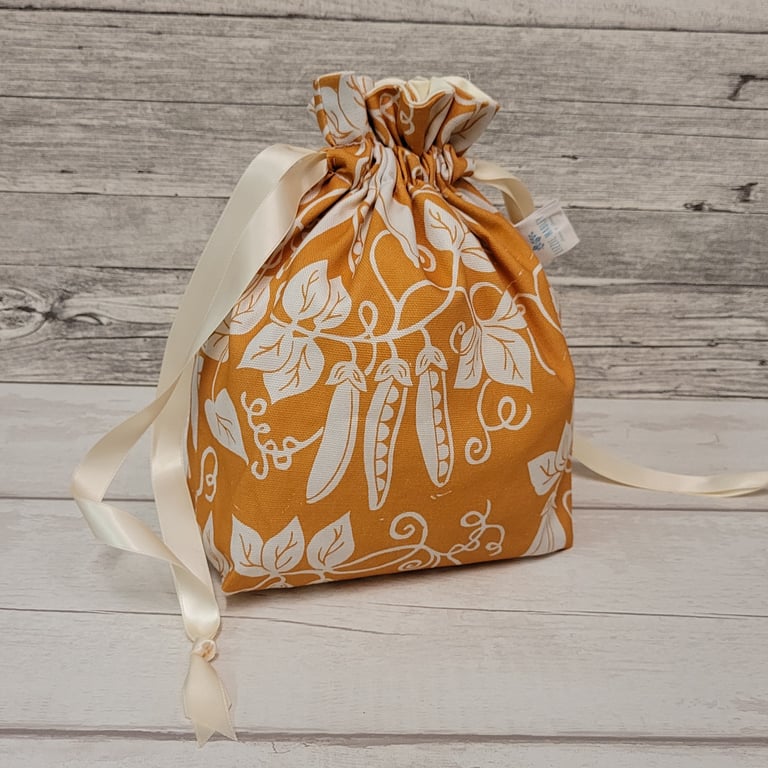 Orange Pea drawstring bag