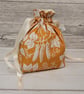 Orange Pea drawstring bag