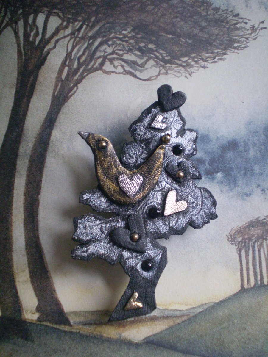  "The Love Bird Tree" made from upcycled leather. 