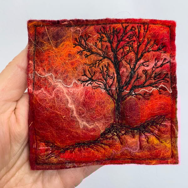 Tree silhouette with sunrise, original wet felting artwork.