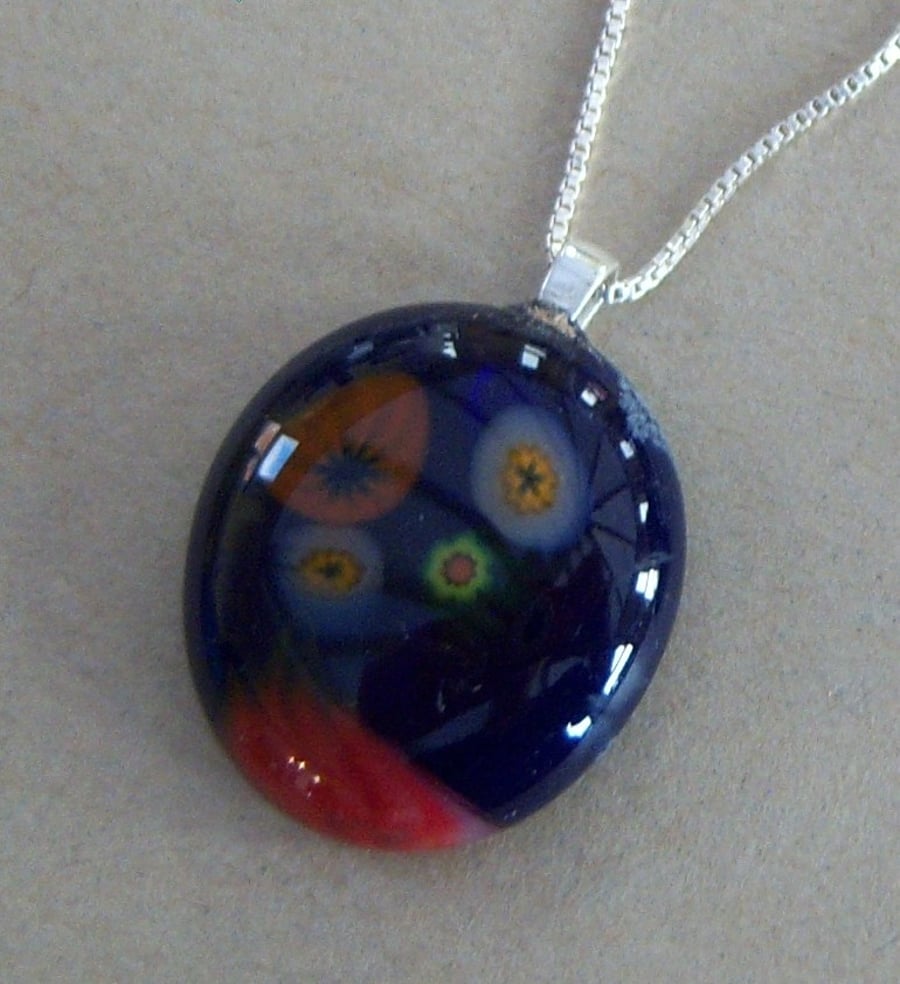 Blue glass pendant with sterling silver