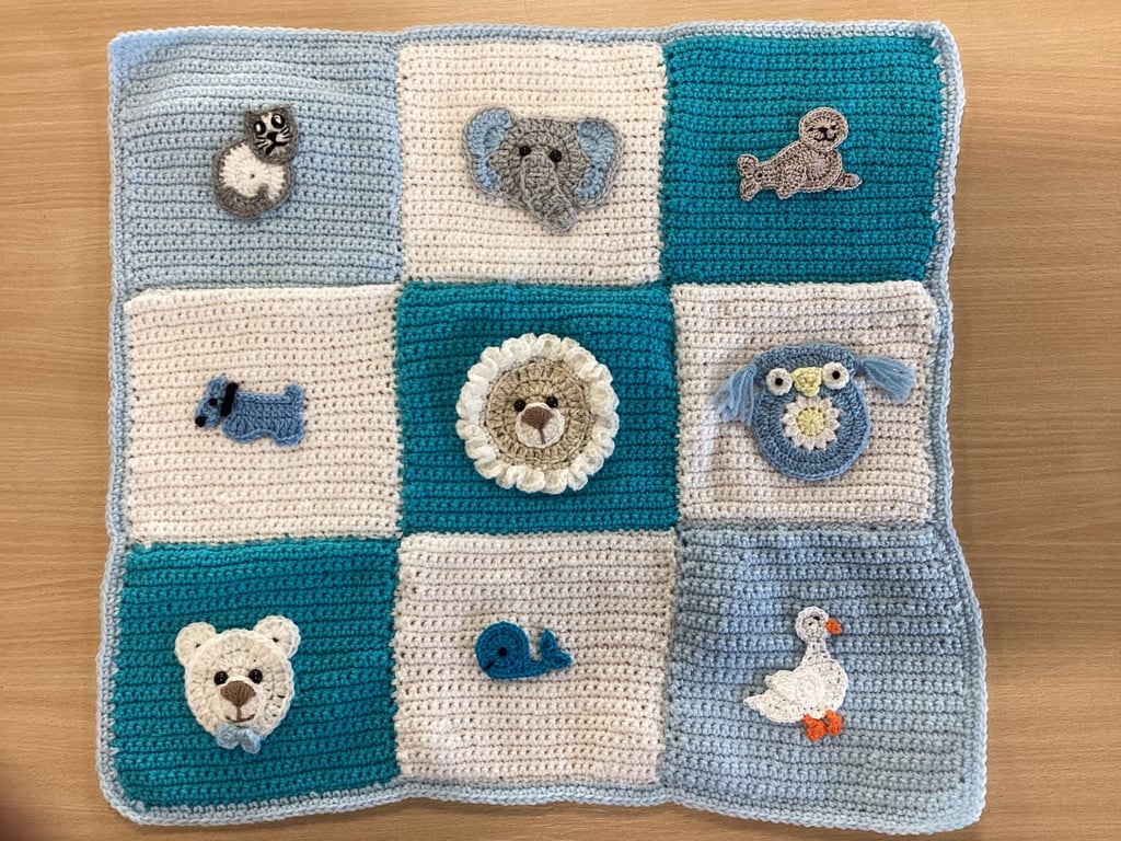 Hand Crocheted Babies blue and white blanket with appliqués 21" x 21"