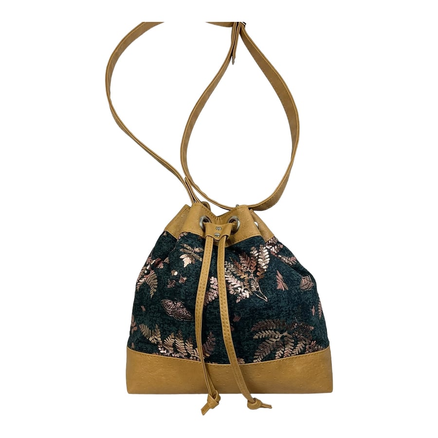 Drawstring bucket crossbody bag made from butterfly print