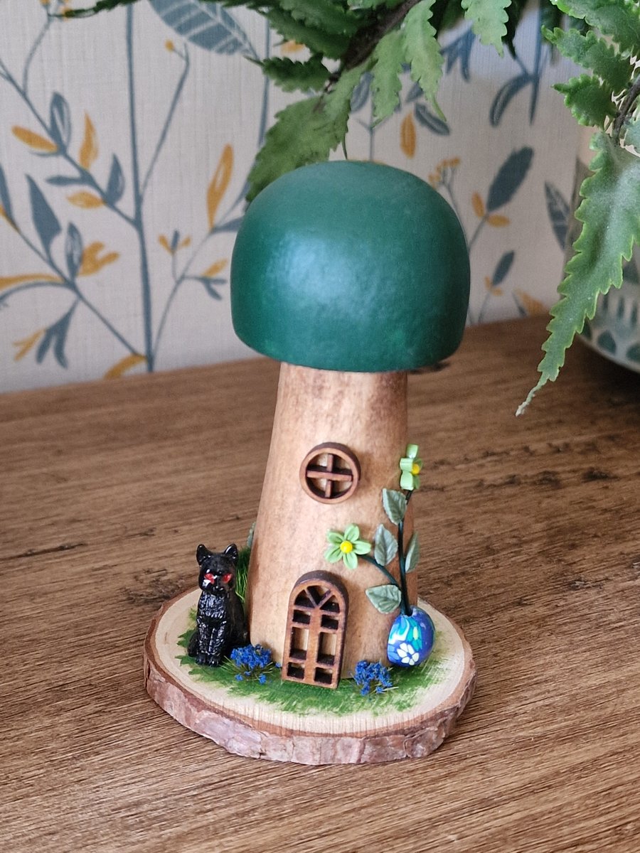 Hand finished Teal wooden fairy mushroom house with a cat in the garden...