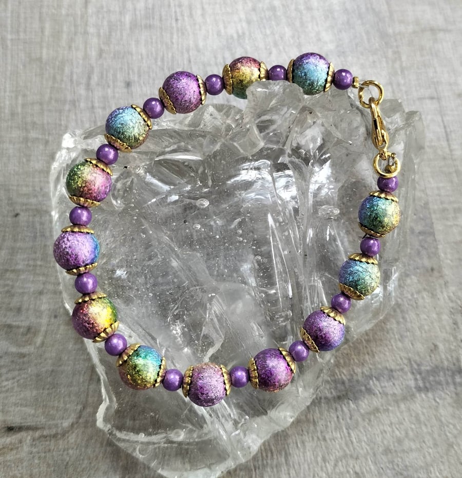 BR450 Rainbow purple miracle bead bracelet