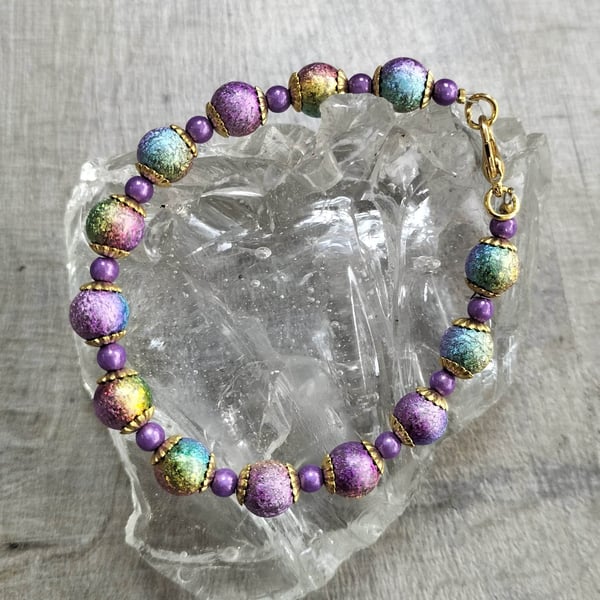BR450 Rainbow purple miracle bead bracelet