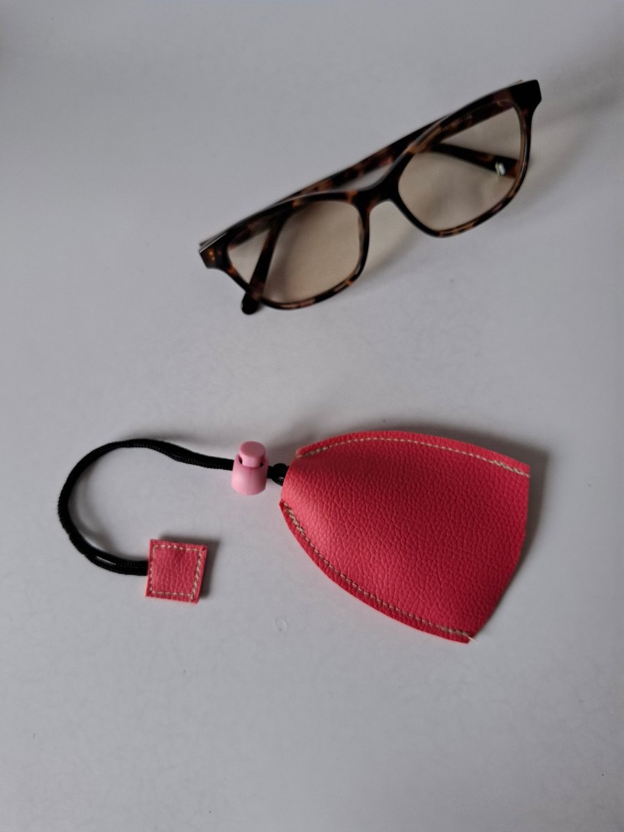 Glass, sunglasses handbag , utility bag cleaning cloth.