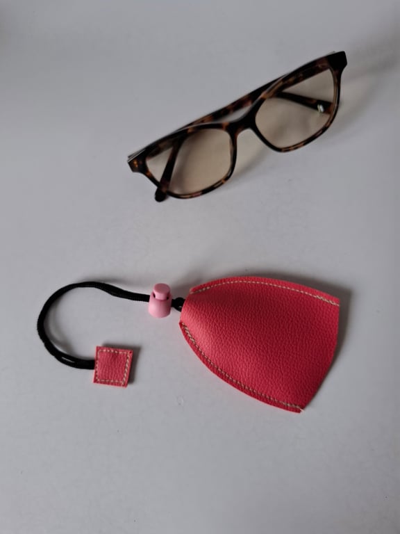 Glass, sunglasses handbag , utility bag cleaning cloth.
