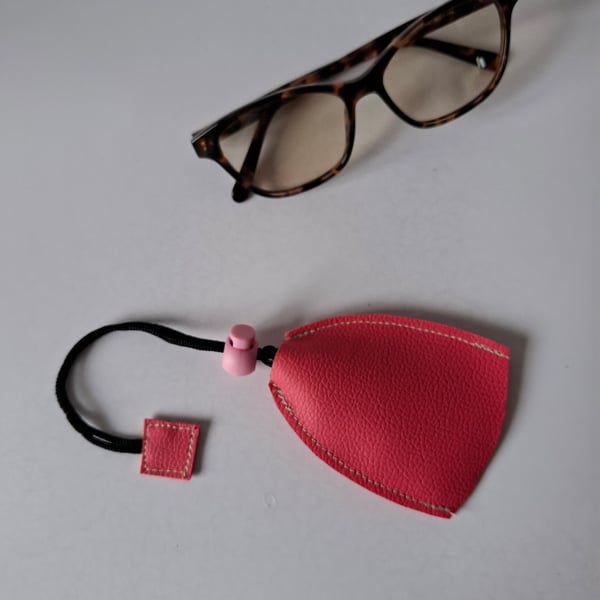 Glass, sunglasses handbag , utility bag cleaning cloth.