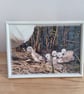 Cygnets climbing onto nest