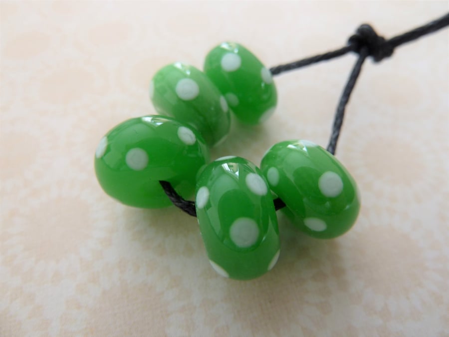 handmade green and white spots lampwork glass beads