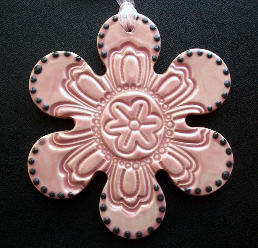 Bright ceramic flower decoration.