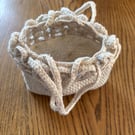 Small crochet handbag in cream. Frilly and cute, lined with cotton fabric