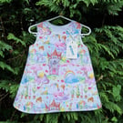 Age: 6-12m. Princesses, Unicorns and Castles Dress. 