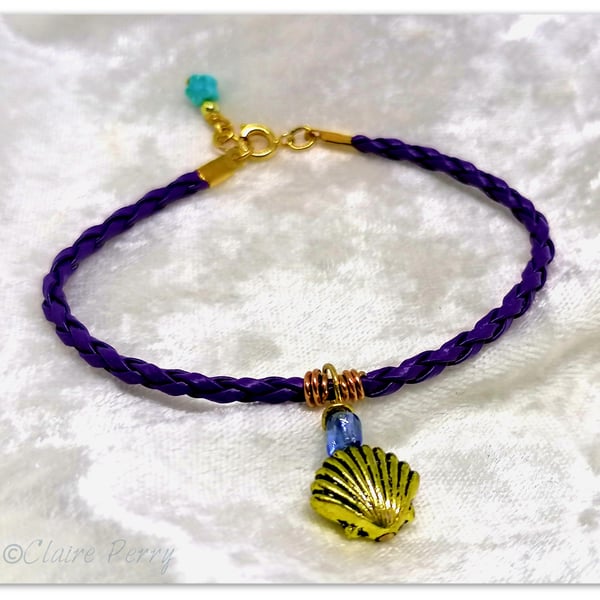 Bracelet Purple Faux Leather with gold plated Seashell charm bead.