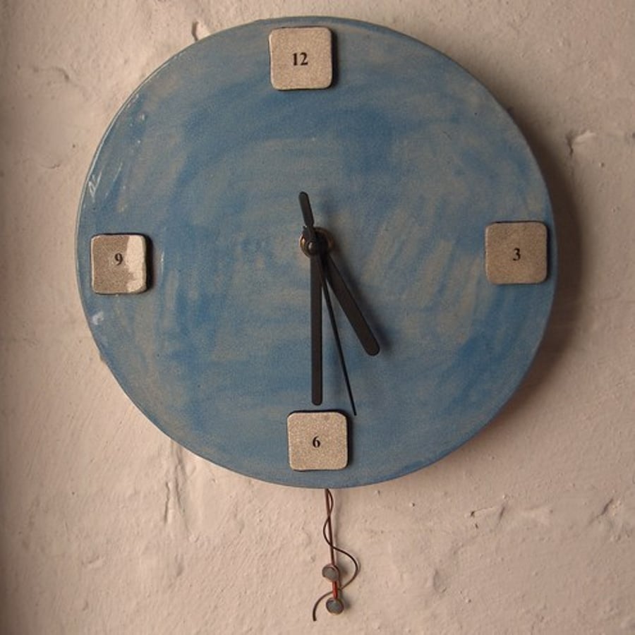 Blue Pendulum Clock.