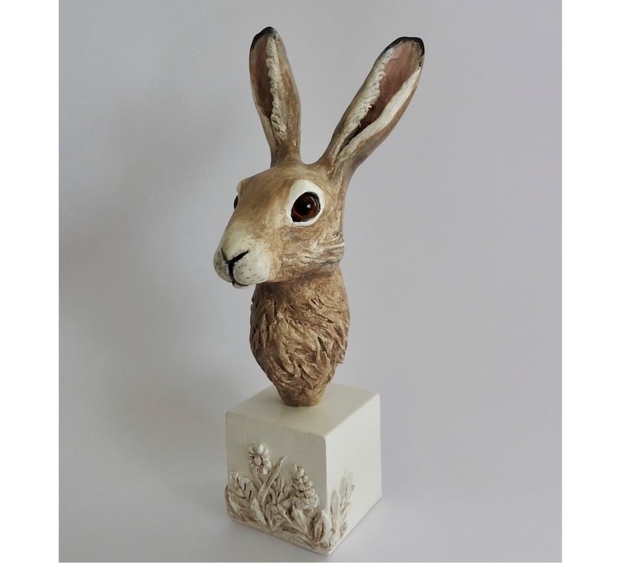 Unique hand crafted Sculpture of a Hare fixed on a plaster & clay plinth
