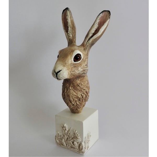 Unique hand crafted Sculpture of a Hare fixed on a plaster & clay plinth